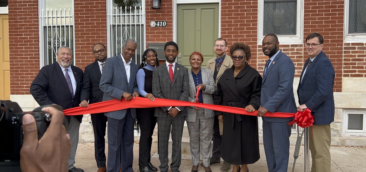Picture of ribbon cutting for Homeownership Works Phase 1 of Completion at Johnston Square